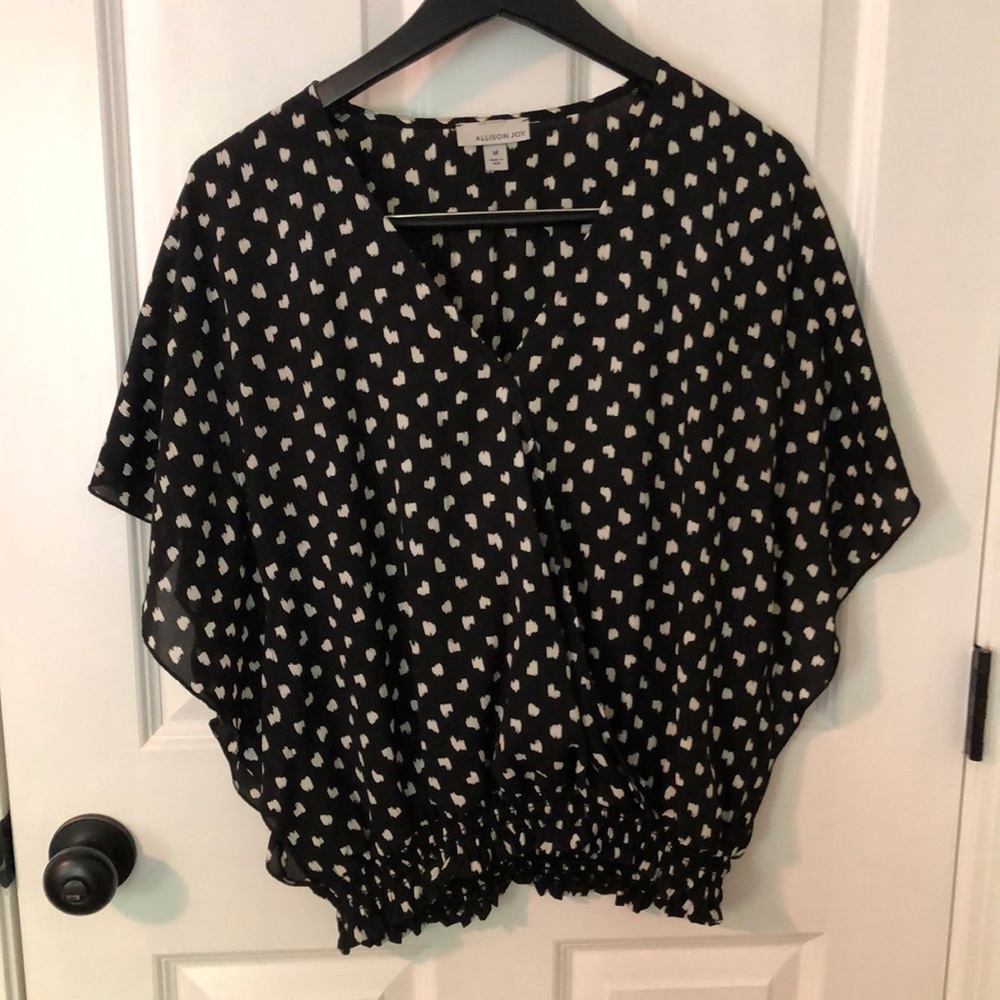 V-neck blouse with “bat-wing” style sleeves
